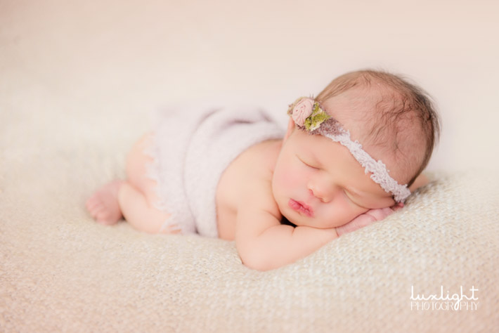cute newborn photography pose for portrait session