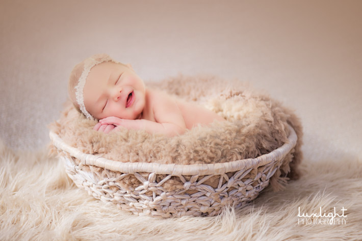 newborn baby in basket for photography ideas
