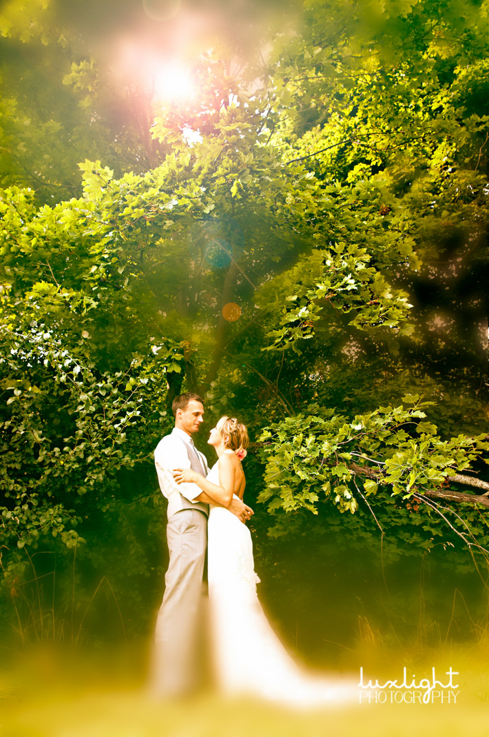 romantic outdoor wedding photo in the woods
