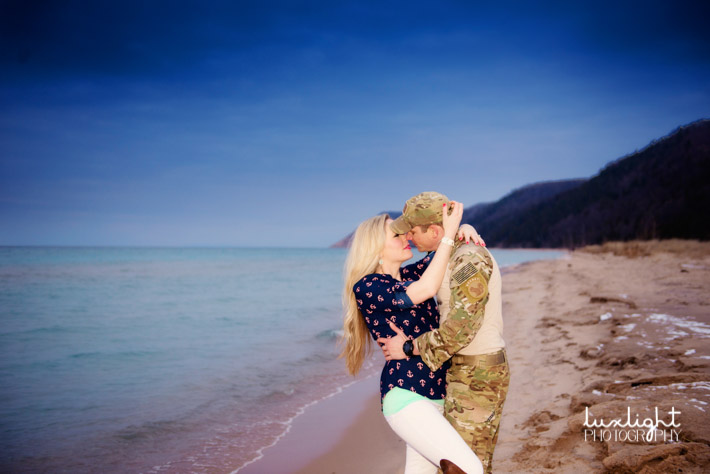 romantic kiss at beach for engagement pictures