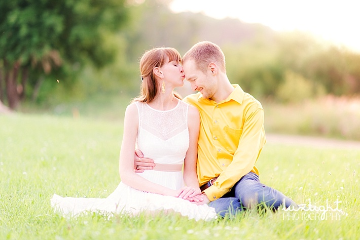 sitting in field engagement photography