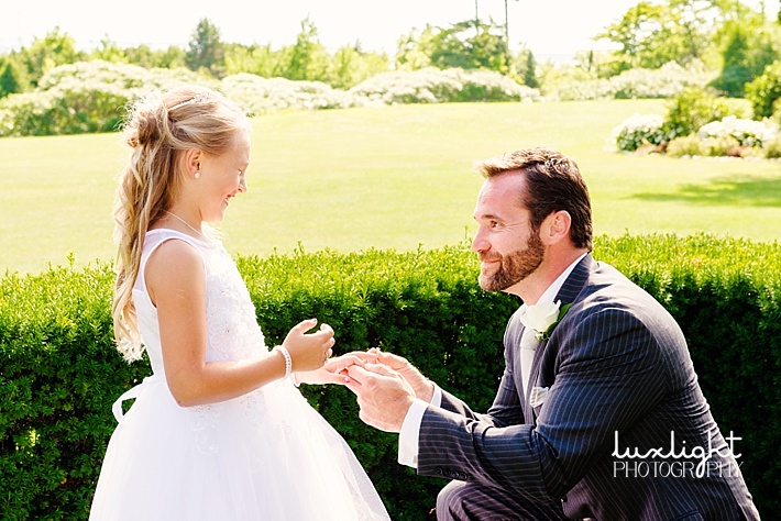 groom gives daughter a ring