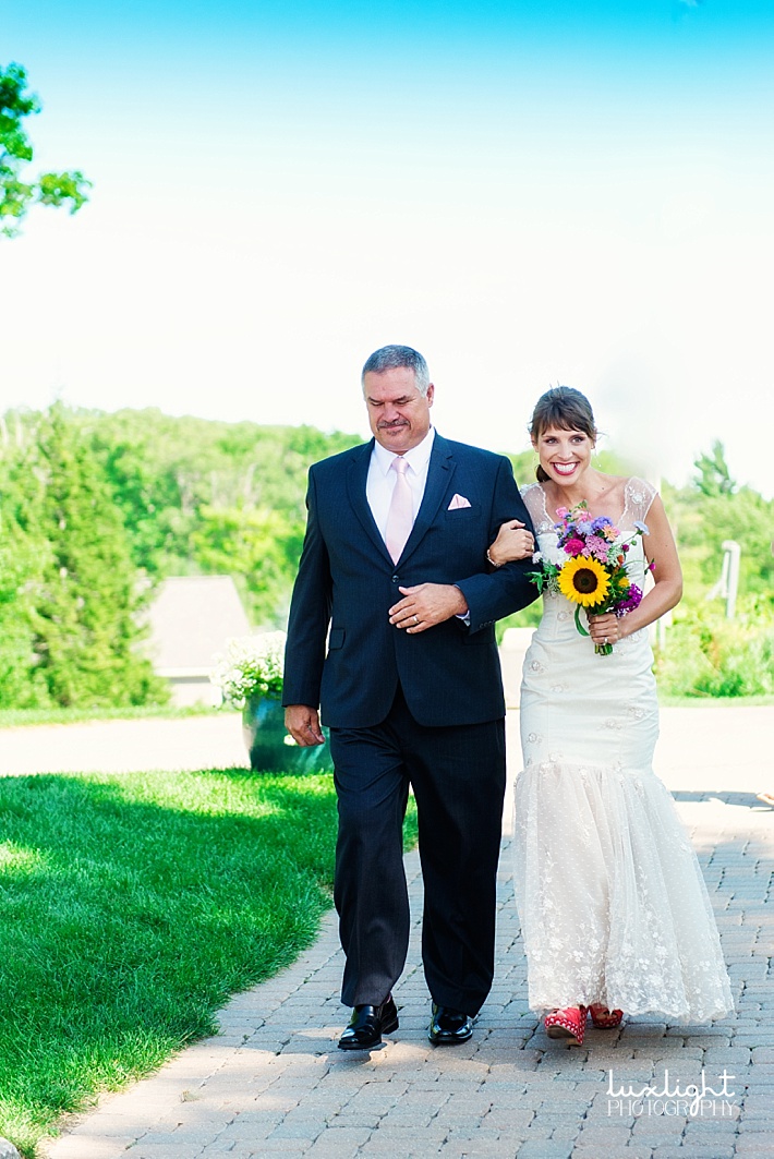 bride and father walking down isle