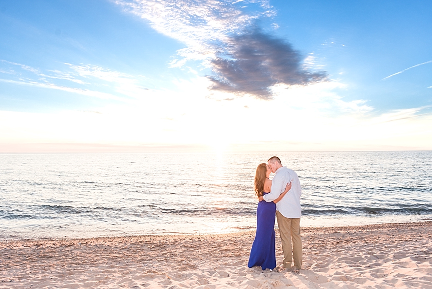 summer engagement portrait pictures on the beach of lake michigan