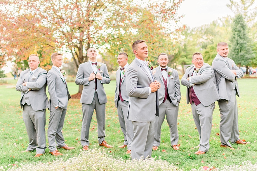 wedding photographers for fall maroon and gold wedding in northern michigan