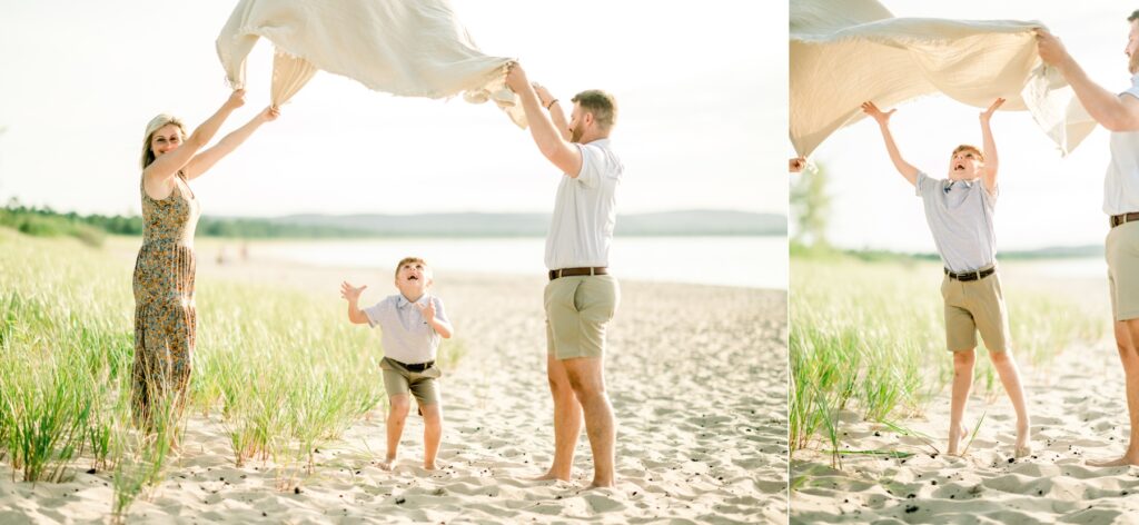 Soft and romantic lighting during early morning beach family photos in Traverse City, MI