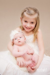 newborn baby pose with old sibling picture