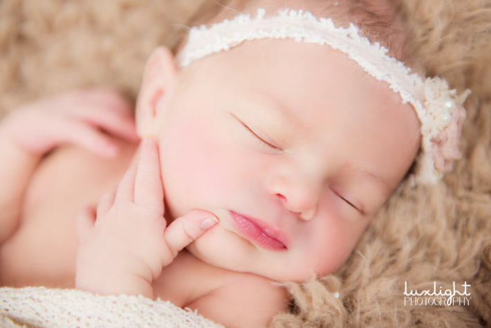 newborn photography idea in soft fur