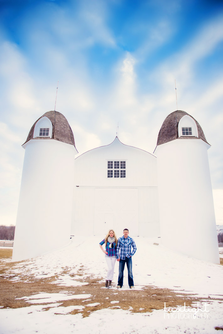 white barn for engagement photo