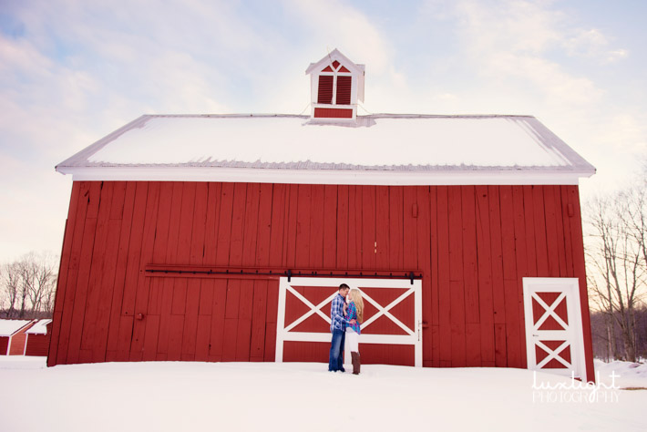 rustic red barn in engagement photos