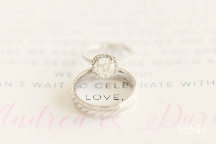 Beautiful halo engagement ring with wedding invitation 