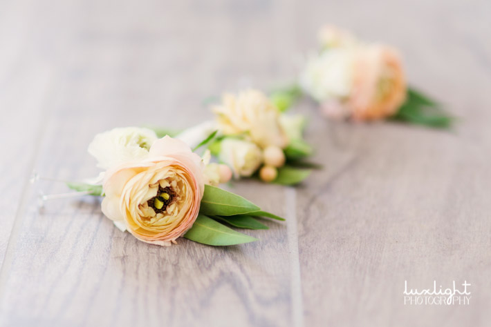 Groom and groomsman peach floral boutonnieres