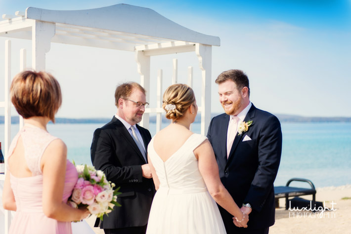 Bride and groom at their beach wedding ceremony at Bay Harbor wedding ceremony