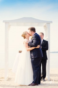 Fist kiss as husband and wife at wedding
