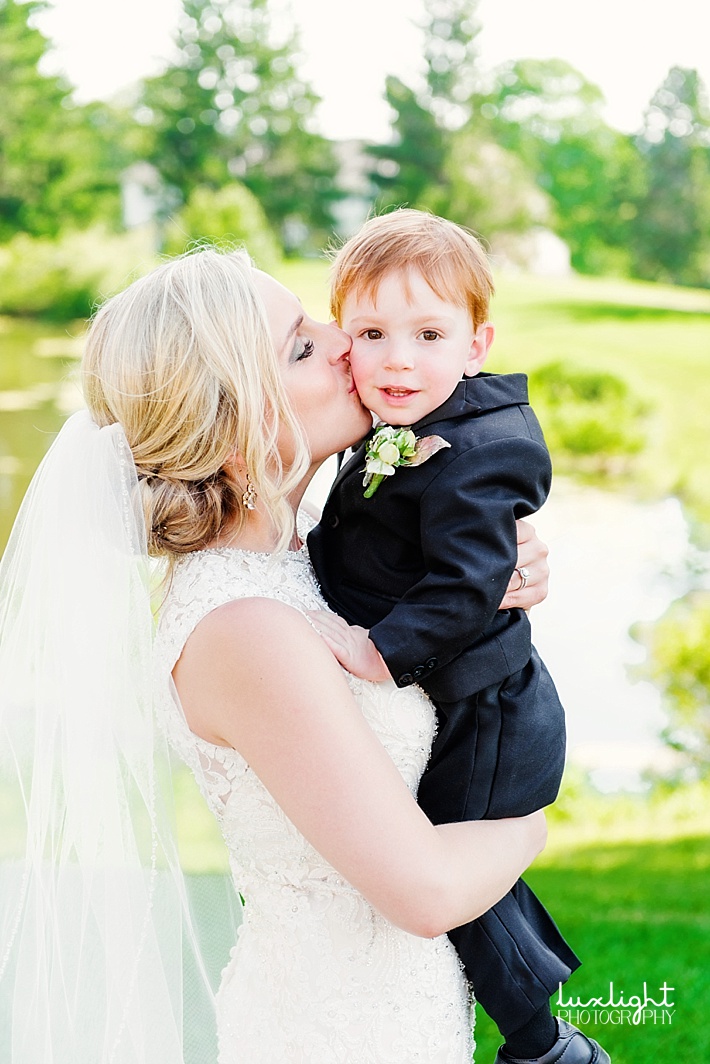adorable ring-bearer with bride