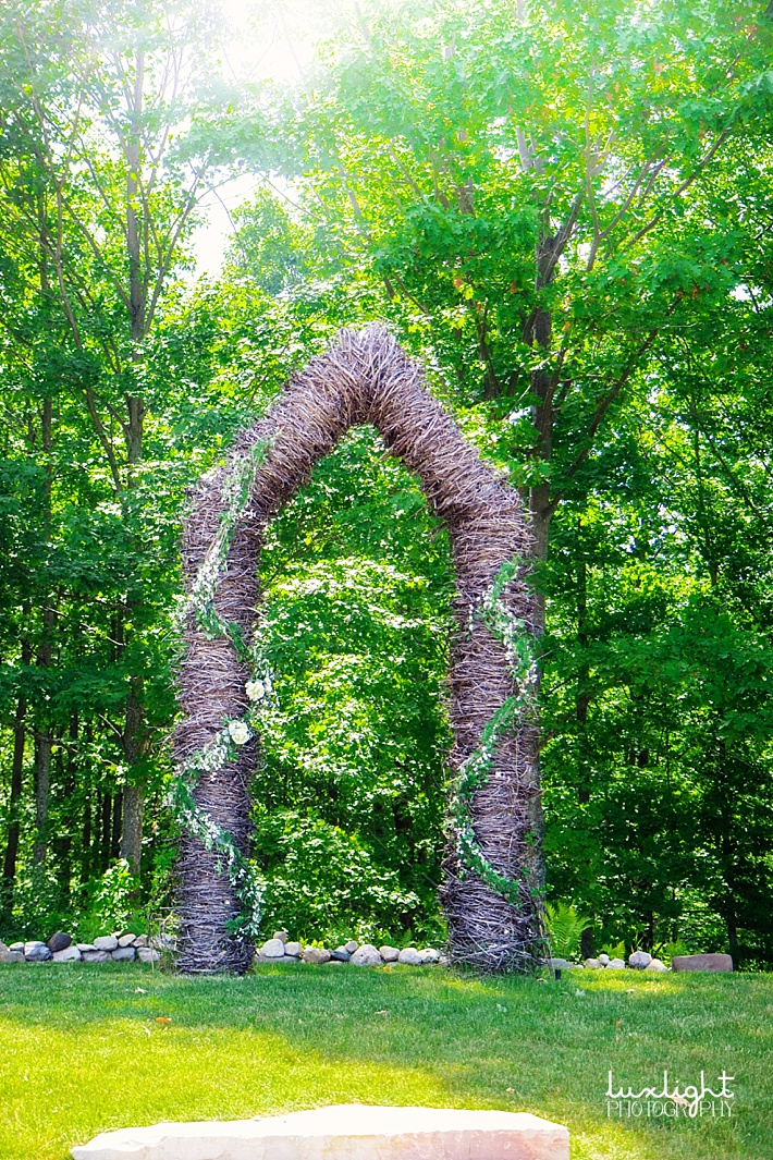 woven branch wedding arch