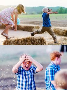 kids playing in hay at wedding