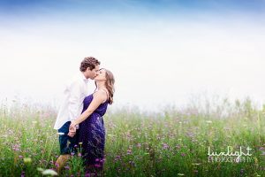 pregnant shoot in field of wild flowers