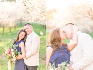 summer engagement portrait pictures in northern michigan during cherry blossoms